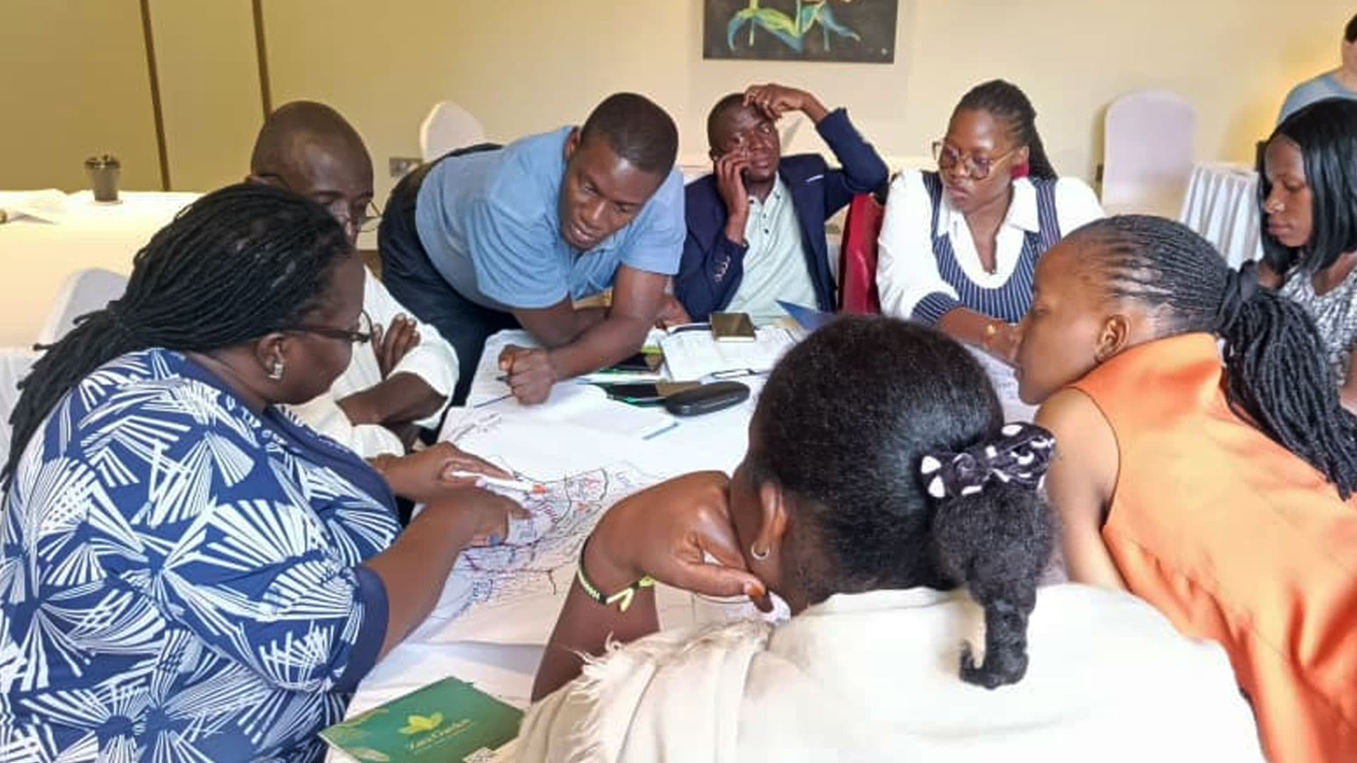 Participants gathered around a meeting table during the Charity Office breakfast meeting