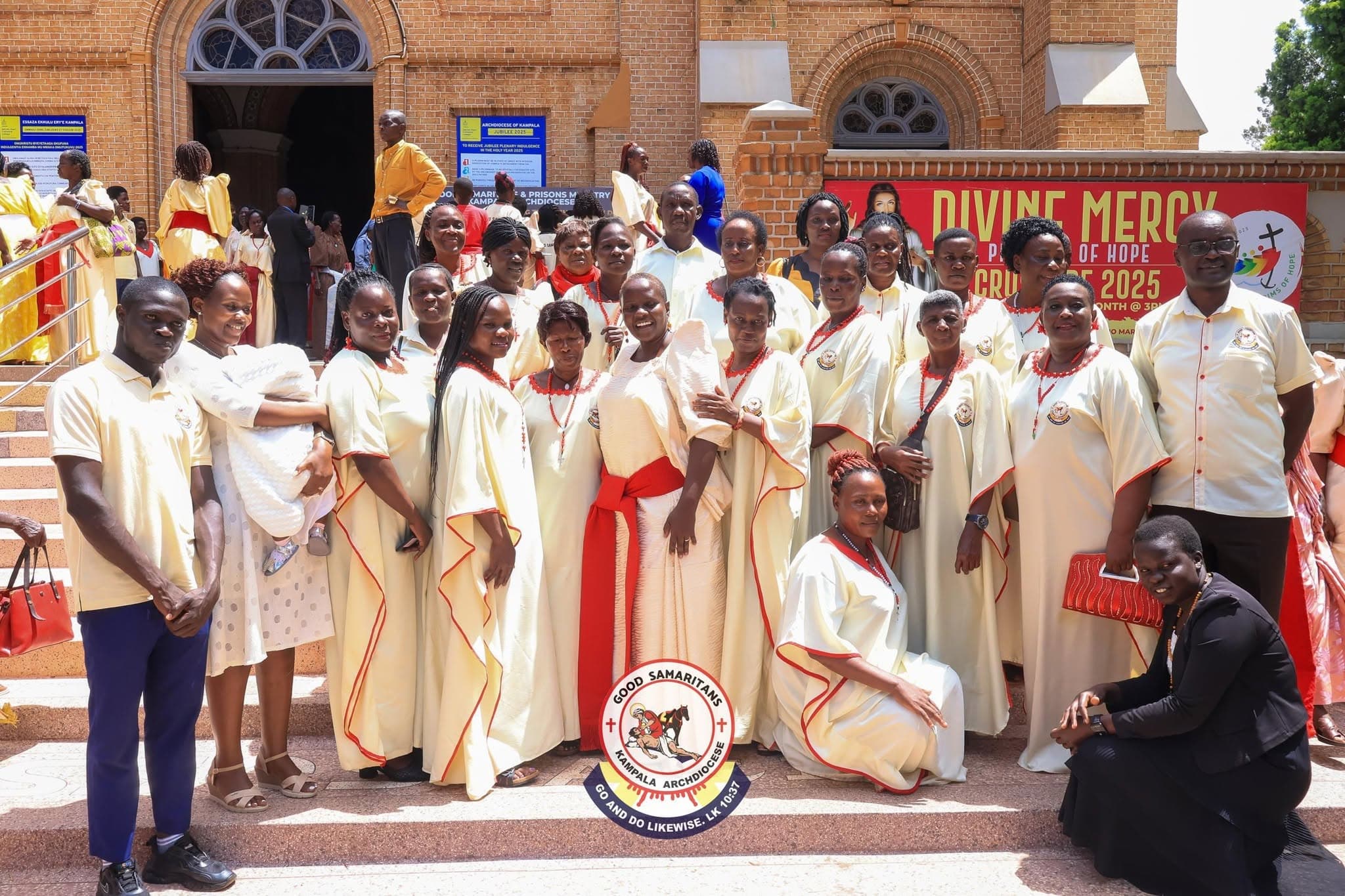 Good Samaritan Kampala Archdiocese members in ceremonial robes gathered outside a parish church